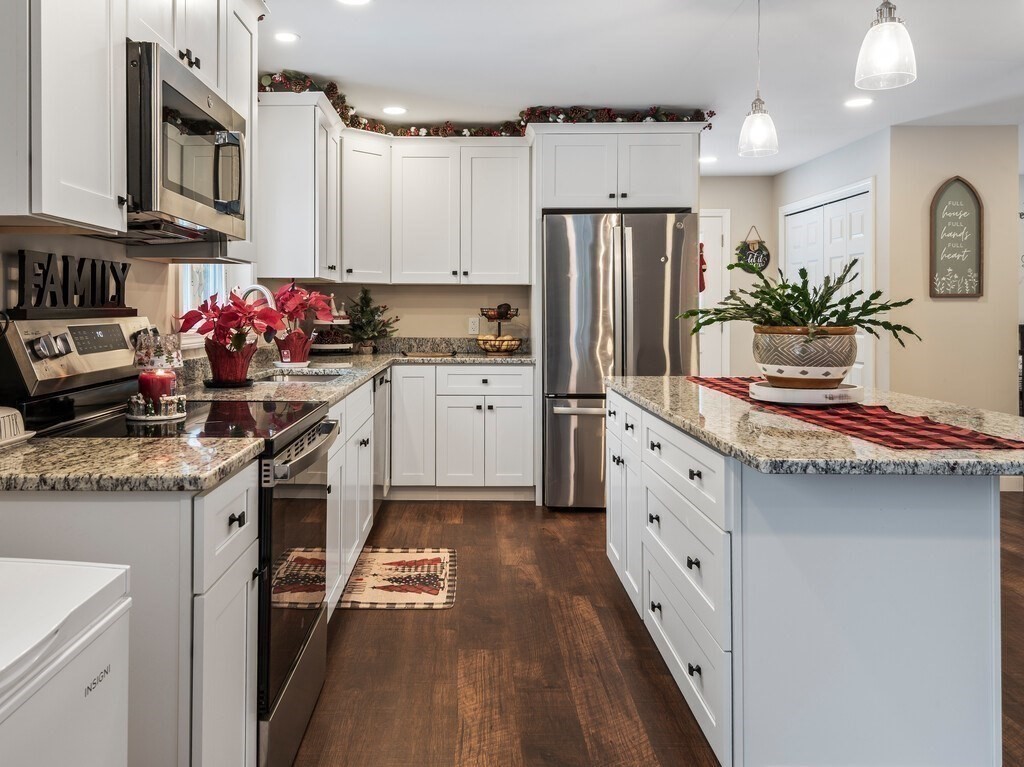 46 Baldwinville State Road Winchendon, MA 01475 - Photo 7 of 37 a kitchen with cabinets and stainless steel appliances