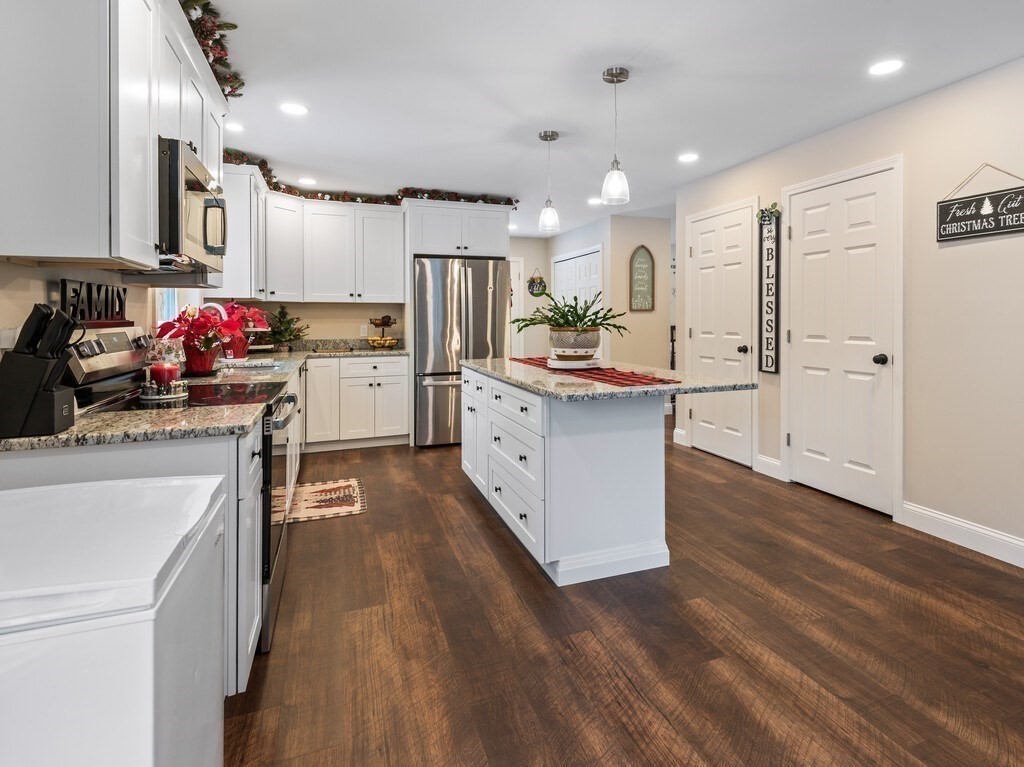 46 Baldwinville State Road Winchendon, MA 01475 - Photo 8 of 37 a kitchen that has a lot of white cabinets and stainless steel appliances