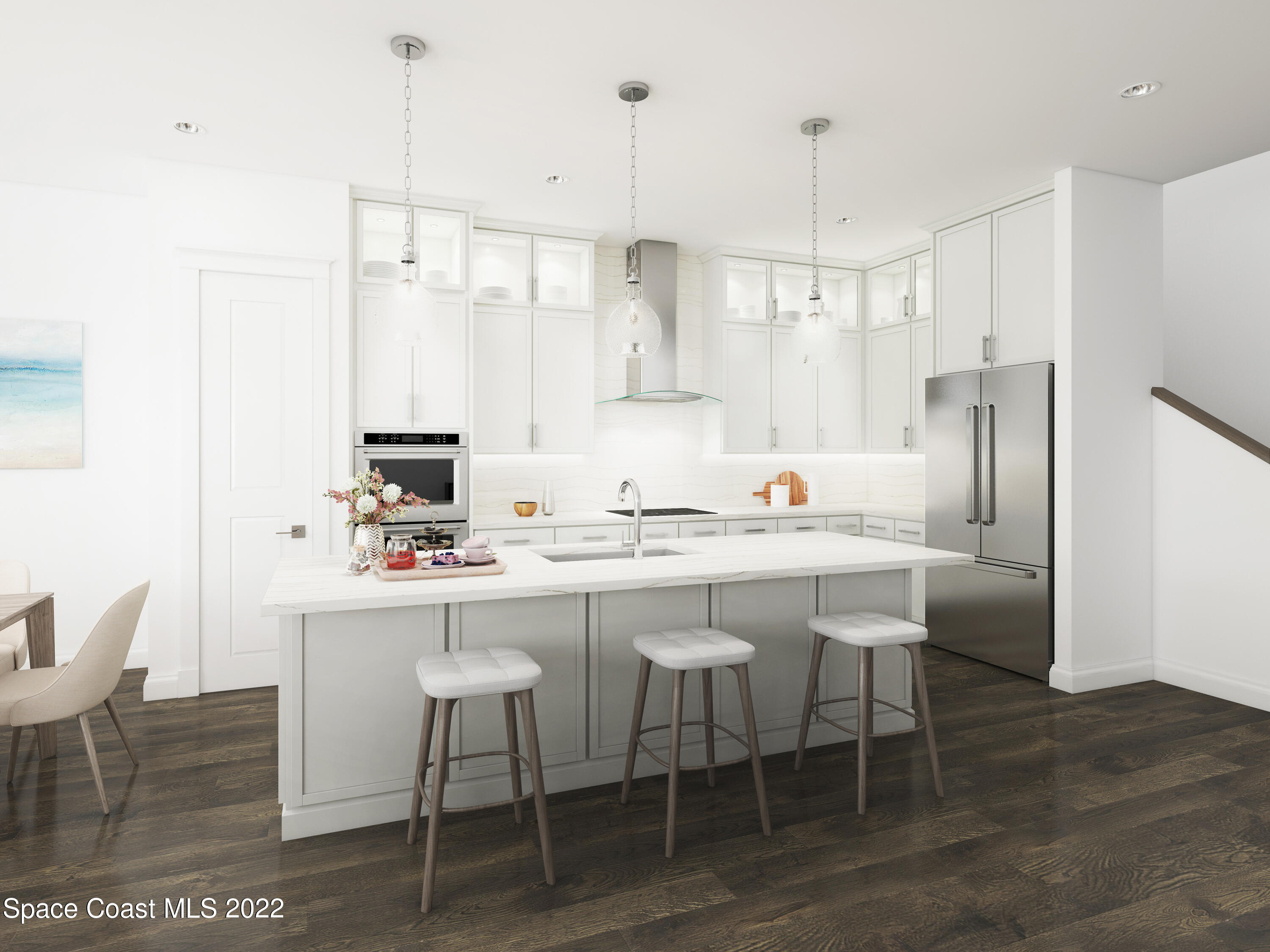 111 Watson Drive Indialantic, FL 32903 - Photo 3 of 5 a kitchen with stainless steel appliances granite countertop white cabinets and white appliances
