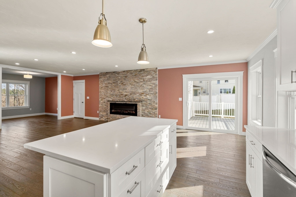 93 Providence Street, Unit B Mendon, MA 01756 - Photo 12 of 37 a open kitchen with sink and entryway