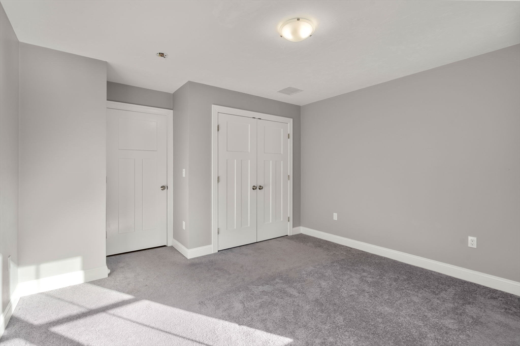93 Providence Street, Unit B Mendon, MA 01756 - Photo 21 of 37 a view of an empty room
