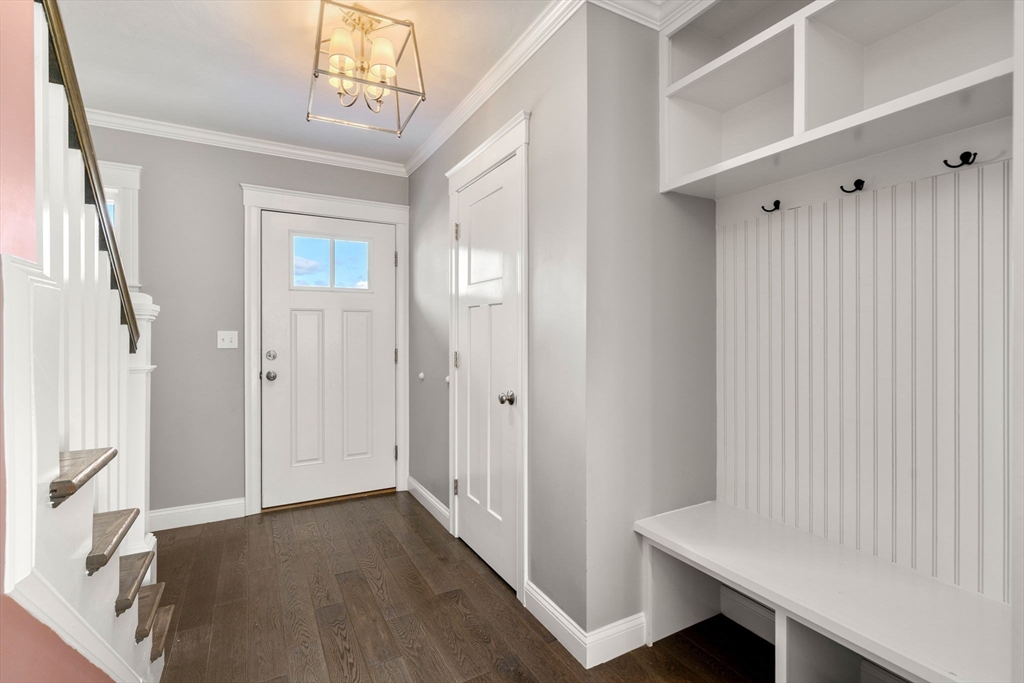93 Providence Street, Unit B Mendon, MA 01756 - Photo 7 of 37 a view of a hallway with entryway door