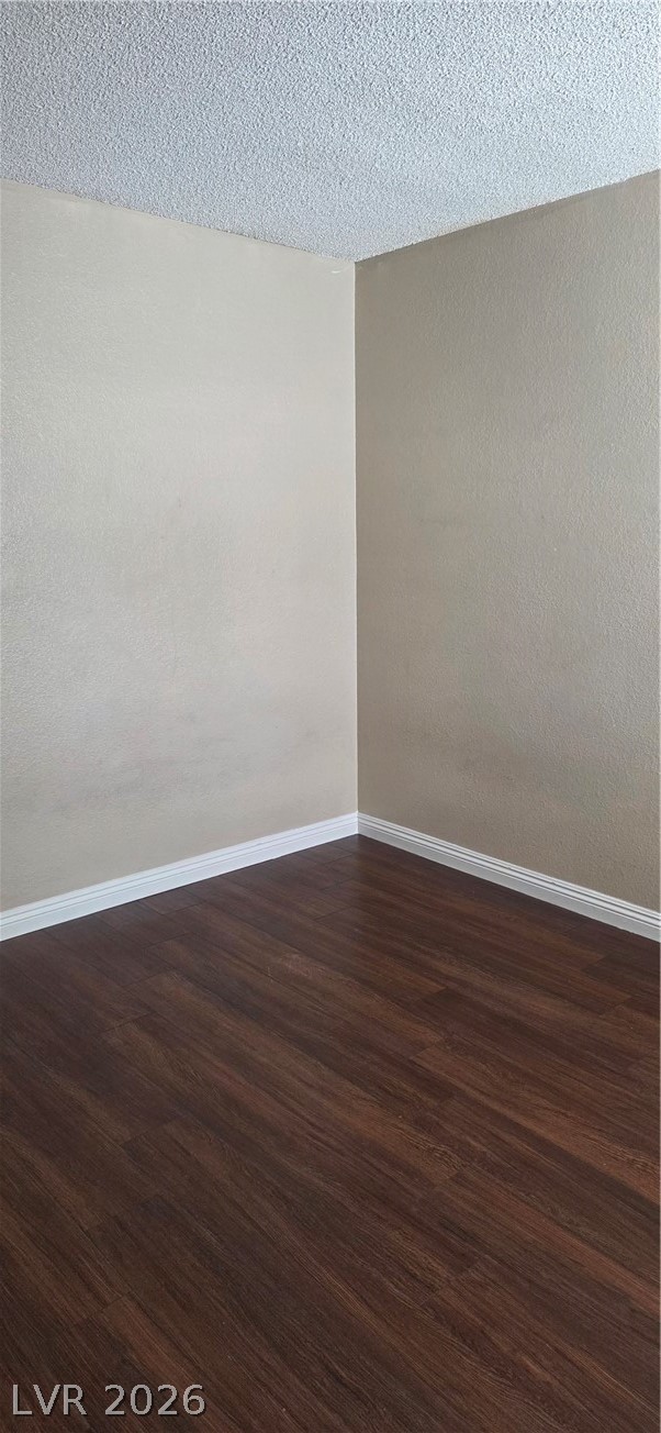 571 Roxella Lane, Unit C Las Vegas, NV 89110 - Photo 13 of 14 This versatile room features durable flooring and a neutral palette, ready for your personal touch.