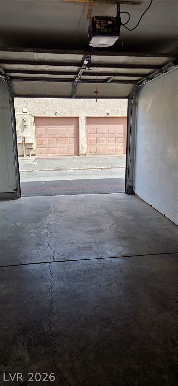 571 Roxella Lane, Unit C Las Vegas, NV 89110 - Photo 10 of 14 Secure parking space with automatic garage door opener, offering convenient access.