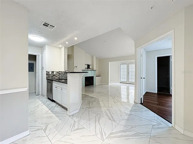 a view of a room with an empty space