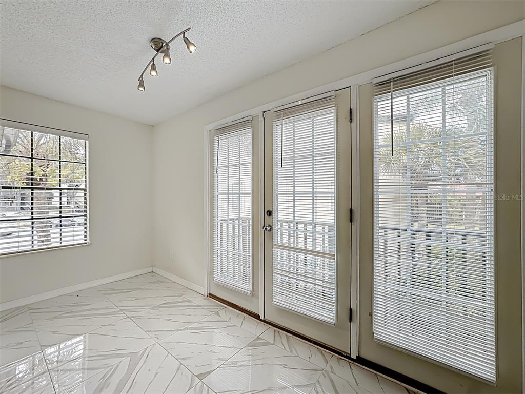 232 Afton Square, Unit 201 Altamonte Springs, FL 32714 - Photo 27 of 54 a view of an empty room with a window
