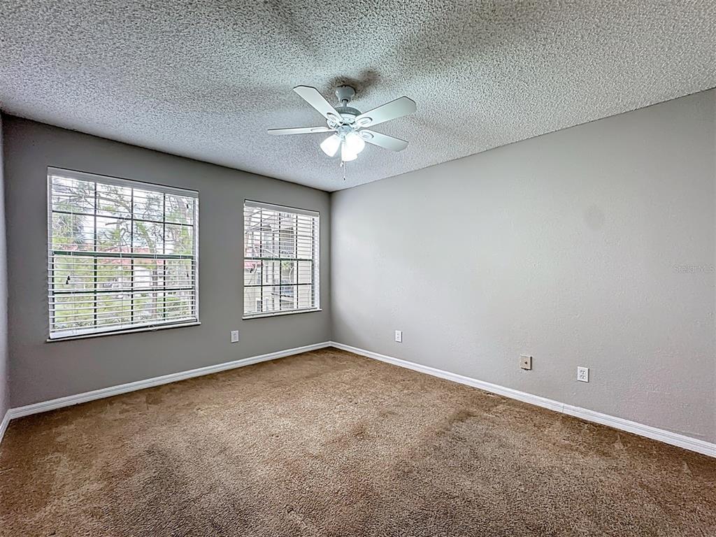 232 Afton Square, Unit 201 Altamonte Springs, FL 32714 - Photo 30 of 54 a view of an empty room with a window