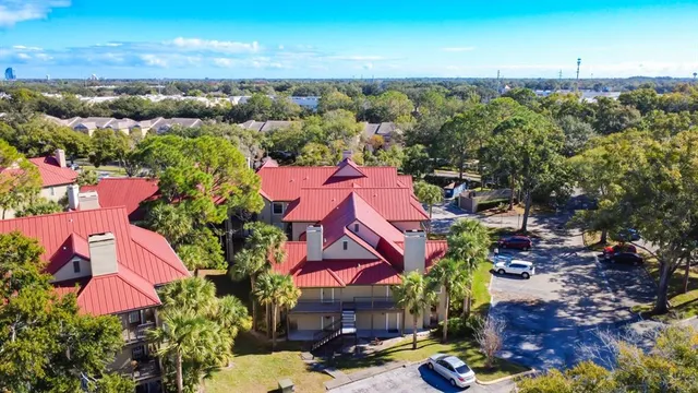 an aerial view of house with yard