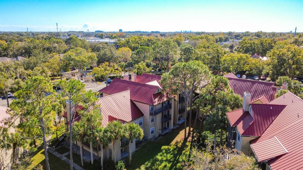 232 Afton Square, Unit 201 Altamonte Springs, FL 32714 - Photo 37 of 54 an aerial view of a house with a yard basket ball court and outdoor seating
