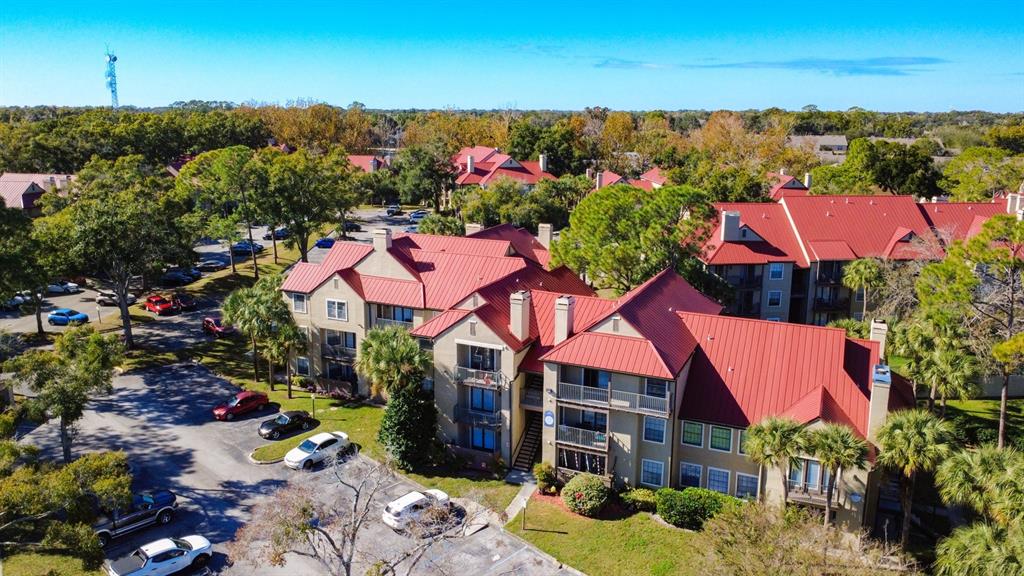 232 Afton Square, Unit 201 Altamonte Springs, FL 32714 - Photo 38 of 54 an aerial view of house with yard