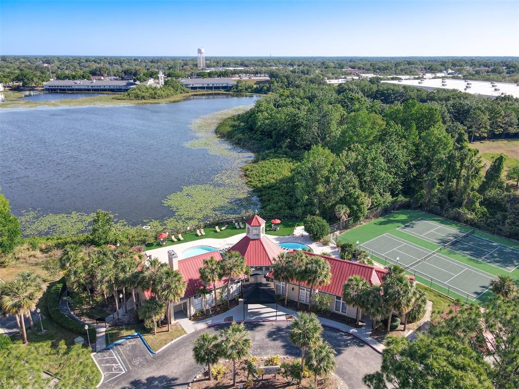 232 Afton Square, Unit 201 Altamonte Springs, FL 32714 - Photo 43 of 54 an aerial view of a houses and an outdoor space