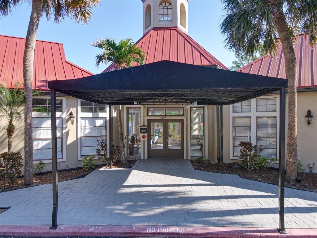 232 Afton Square, Unit 201 Altamonte Springs, FL 32714 - Photo 44 of 54 a view of a house with a porch