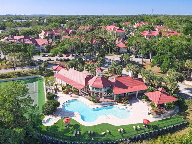 an aerial view of residential house with outdoor space