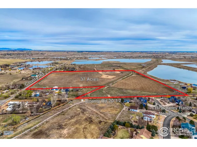a view of water heater and living room