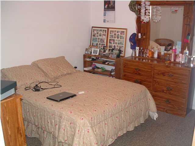 893 Lighthouse Church Road Holt, FL 32564 - Photo 19 of 24 a bedroom with a bed and window