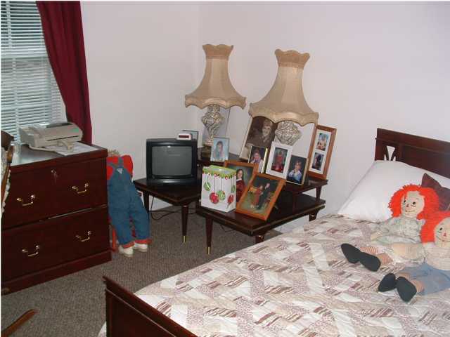 893 Lighthouse Church Road Holt, FL 32564 - Photo 20 of 24 a living room with furniture