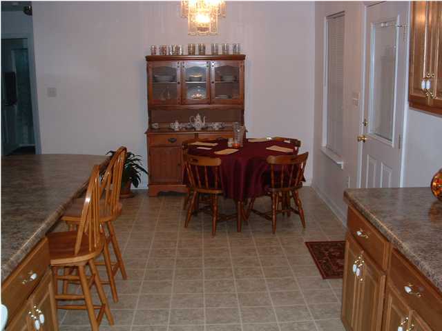 893 Lighthouse Church Road Holt, FL 32564 - Photo 22 of 24 a view of a dining room with furniture