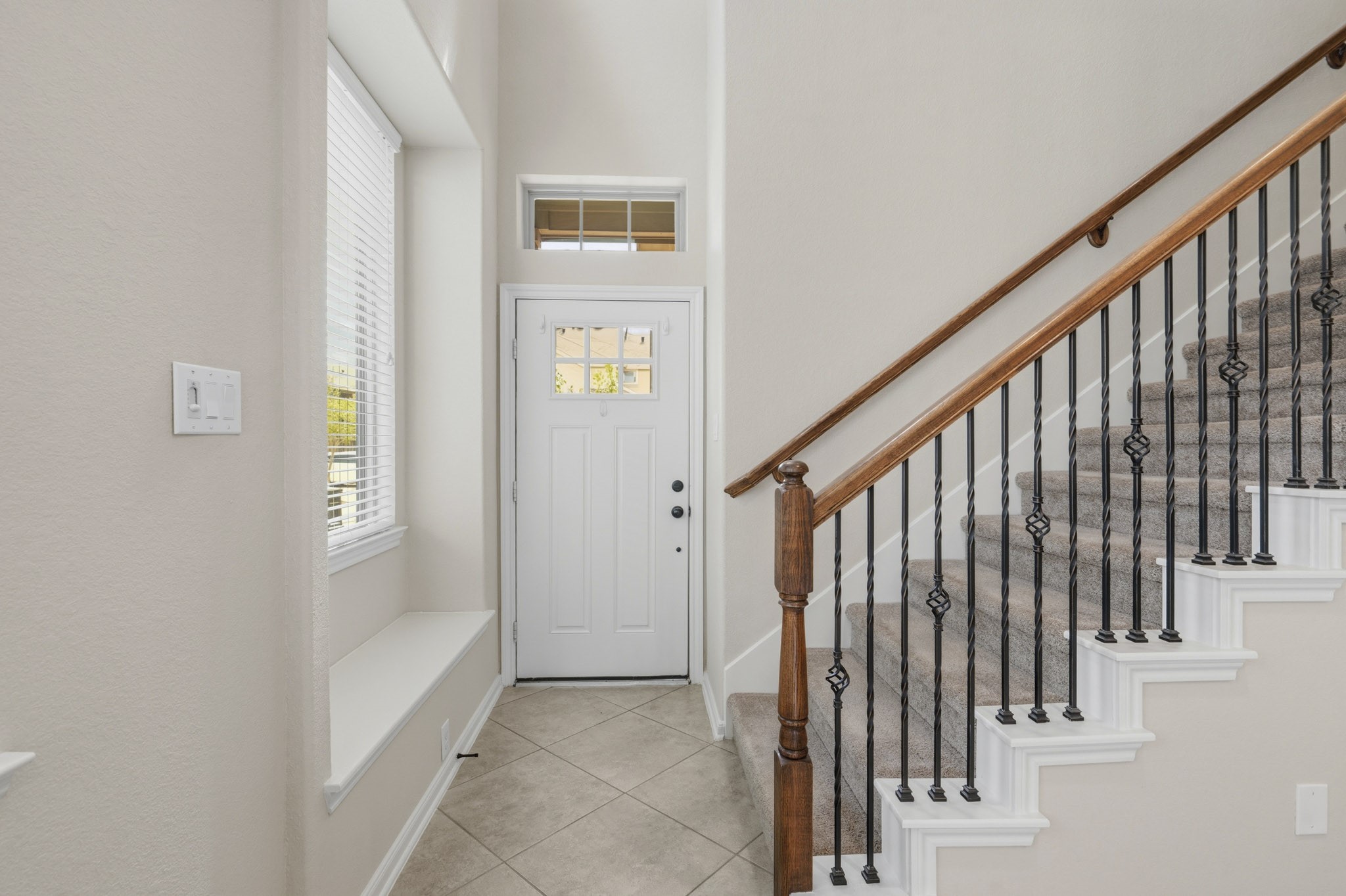 12115 San Luca Street Richmond, TX 77406 - Photo 9 of 44 From the moment guests arrive, they'll appreciate the home's airy feel and thoughtful architectural details. This inviting entryway blends style, comfort, and functionality.