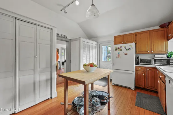 a dining room with furniture window and outside view