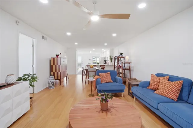 a living room with furniture and a table
