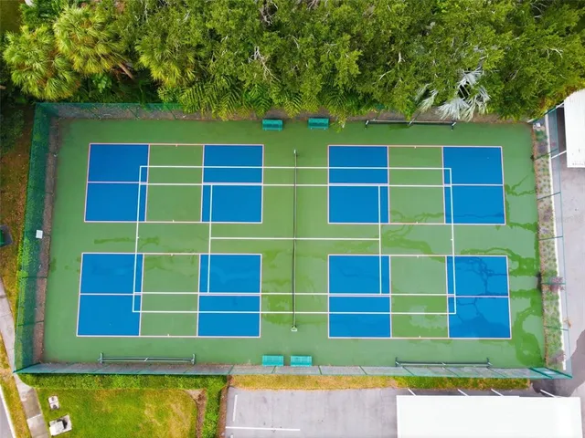 a view of front door of house with a yard