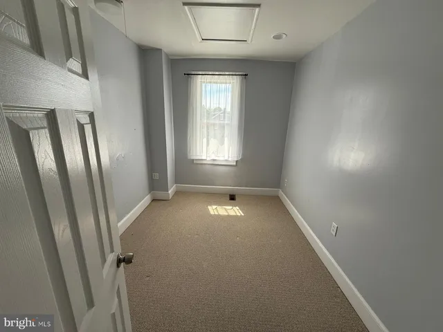 a view of a porch with a big yard