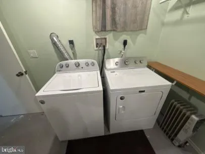 a view of a hallway with windows