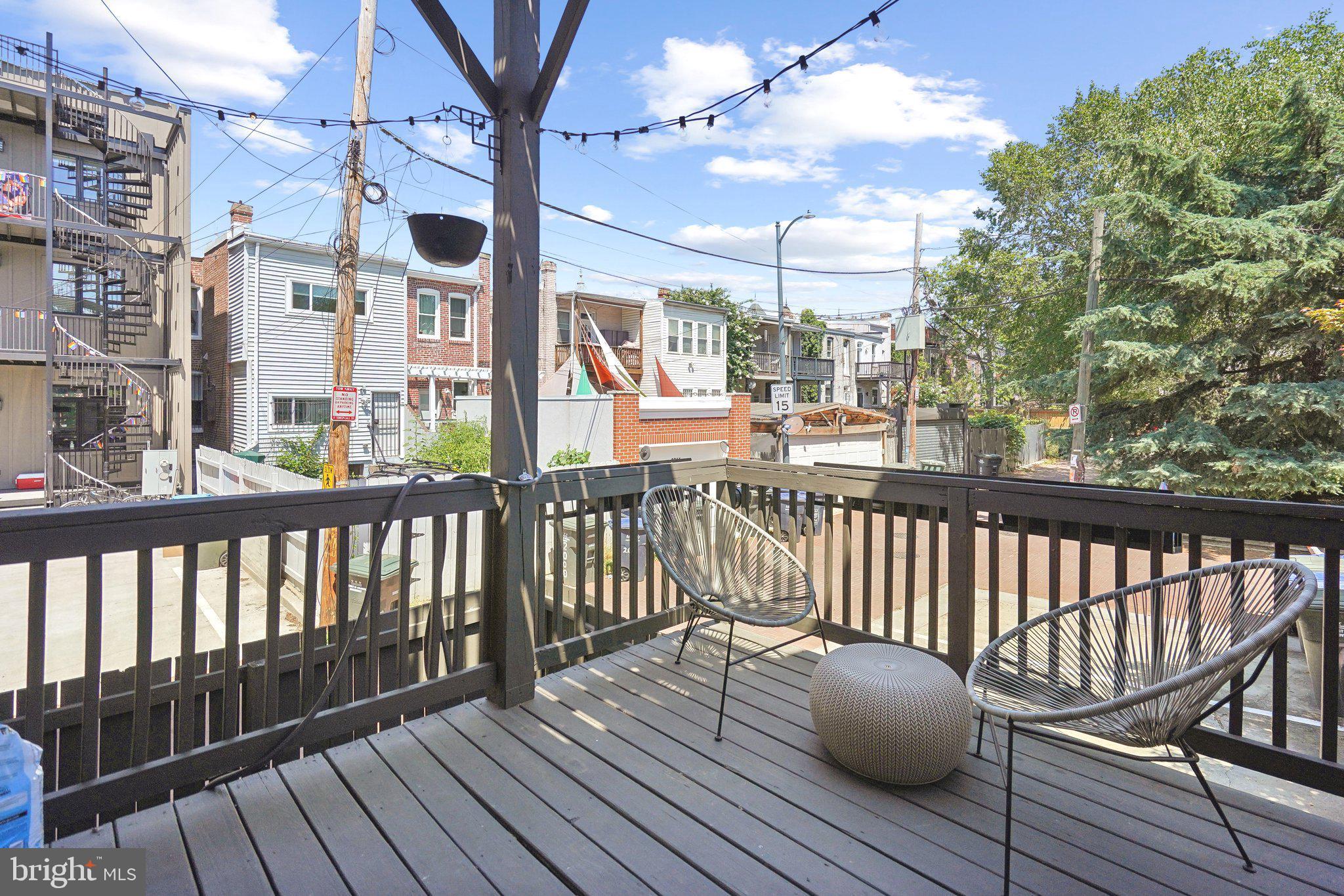 77 U Street Northwest Washington, DC 20001 - Photo 16 of 34 a view of balcony with wooden floor and fence