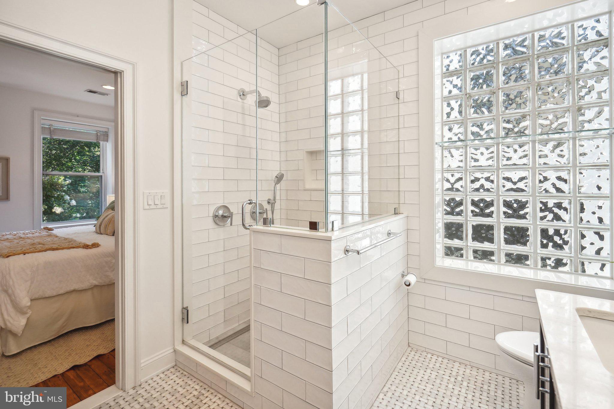 77 U Street Northwest Washington, DC 20001 - Photo 20 of 34 a bathroom with a shower