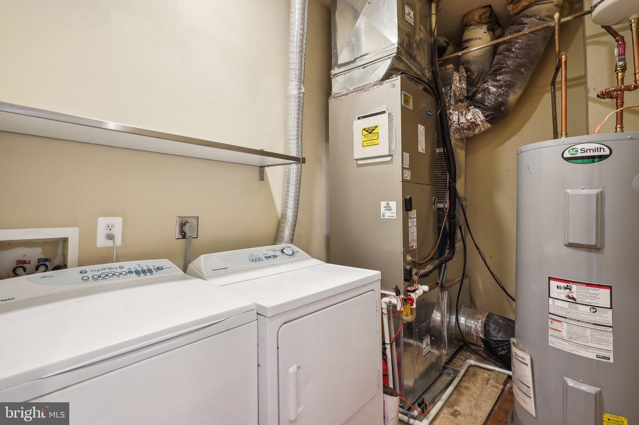 77 U Street Northwest Washington, DC 20001 - Photo 28 of 34 a utility room with dryer and washer