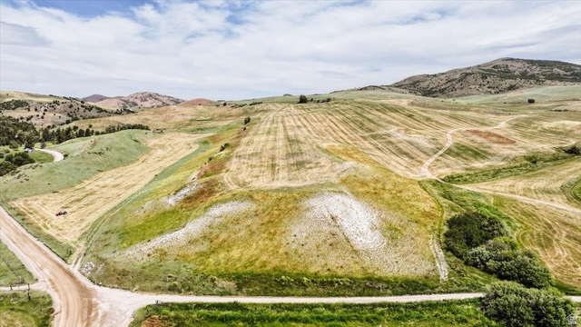 5588 East Glendale Road Preston, ID 83263 - Photo 11 of 11 Expansive open land featuring rolling hills and cultivated fields