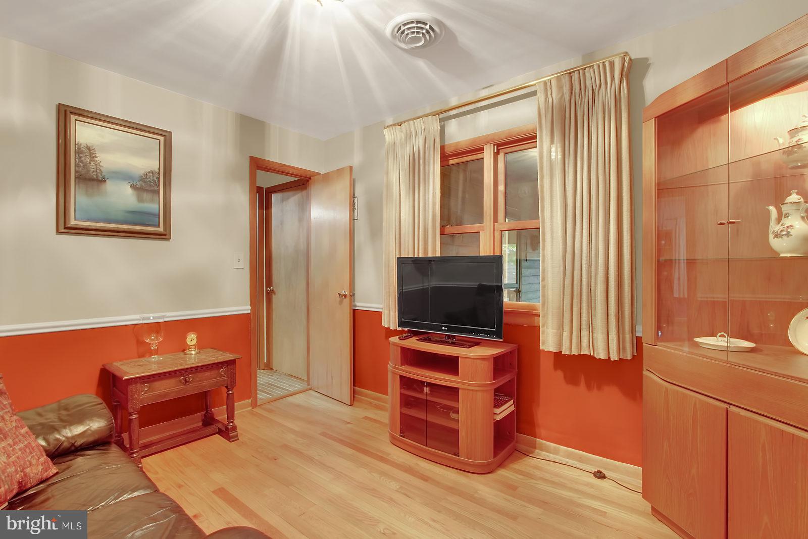 5004 Roller Road Manchester, MD 21102 - Photo 6 of 30 Cozy TV / game room just off of the kitchen.