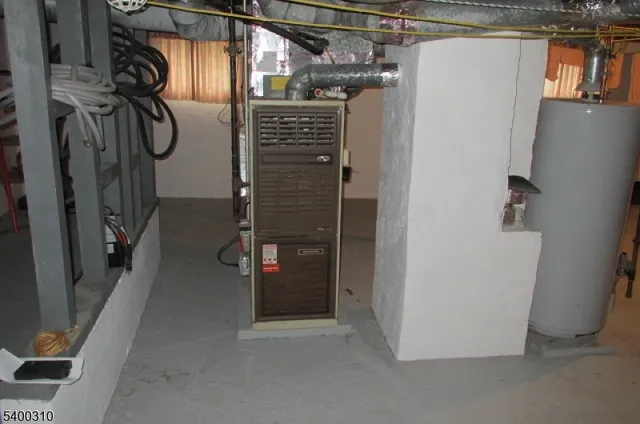 a view of storage and utility room with racks on the wall