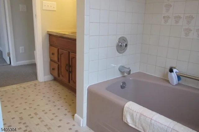 a bathroom with a tub