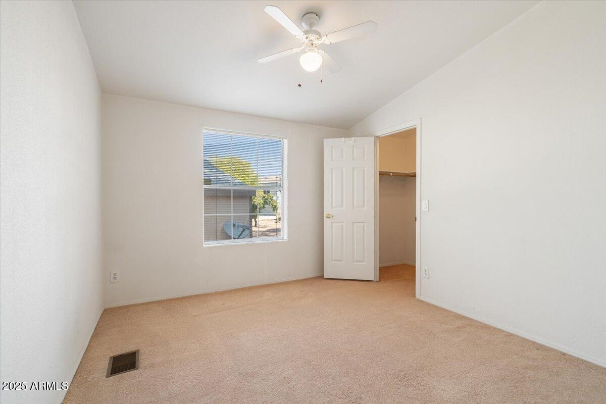 3901 East Pinnacle Peak Road, Unit 43 Phoenix, AZ 85050 - Photo 13 of 29 Guest bedroom w/ walk-in closet.
