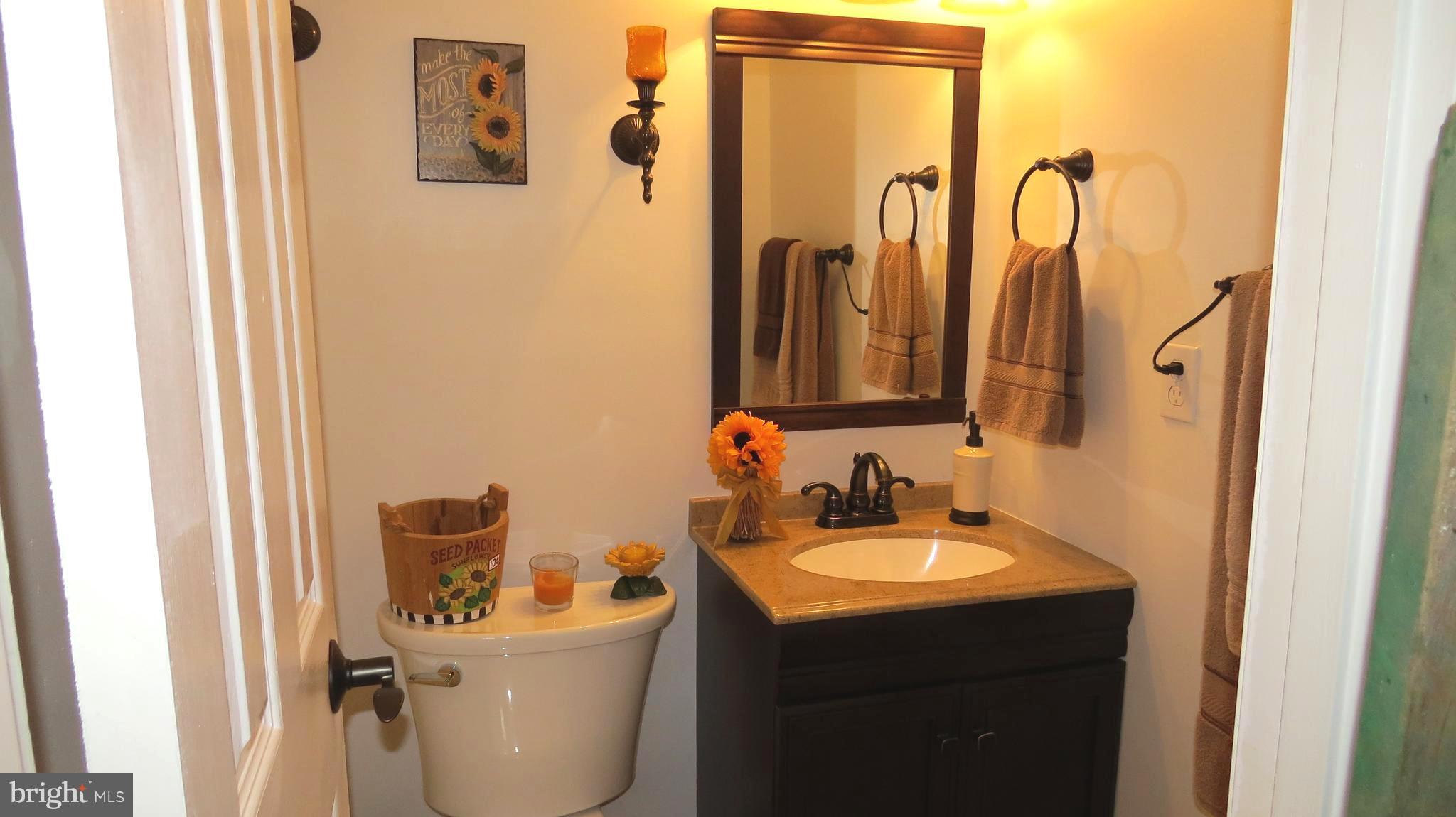 64 Helmsman Court Baltimore, MD 21221 - Photo 11 of 30 Main level powder room