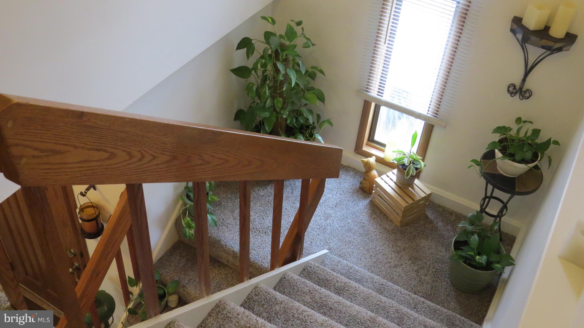 64 Helmsman Court Baltimore, MD 21221 - Photo 19 of 30 Beautiful open stairs to upper level