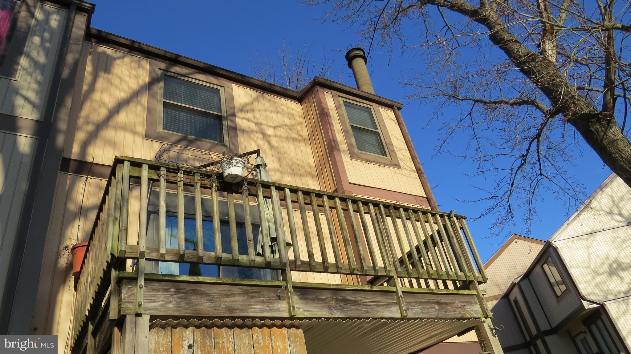 64 Helmsman Court Baltimore, MD 21221 - Photo 26 of 30 Rear deck off of dinning room