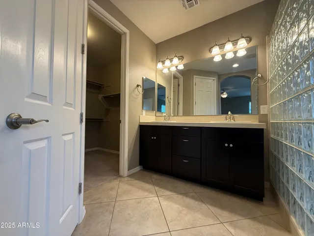 a bathroom with a toilet and a sink