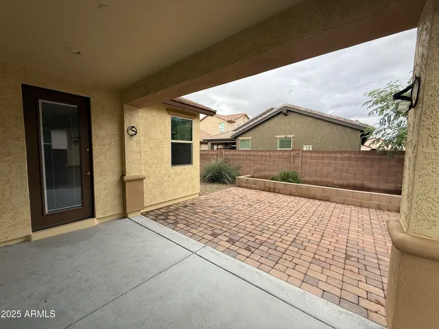 a house view with a backyard space