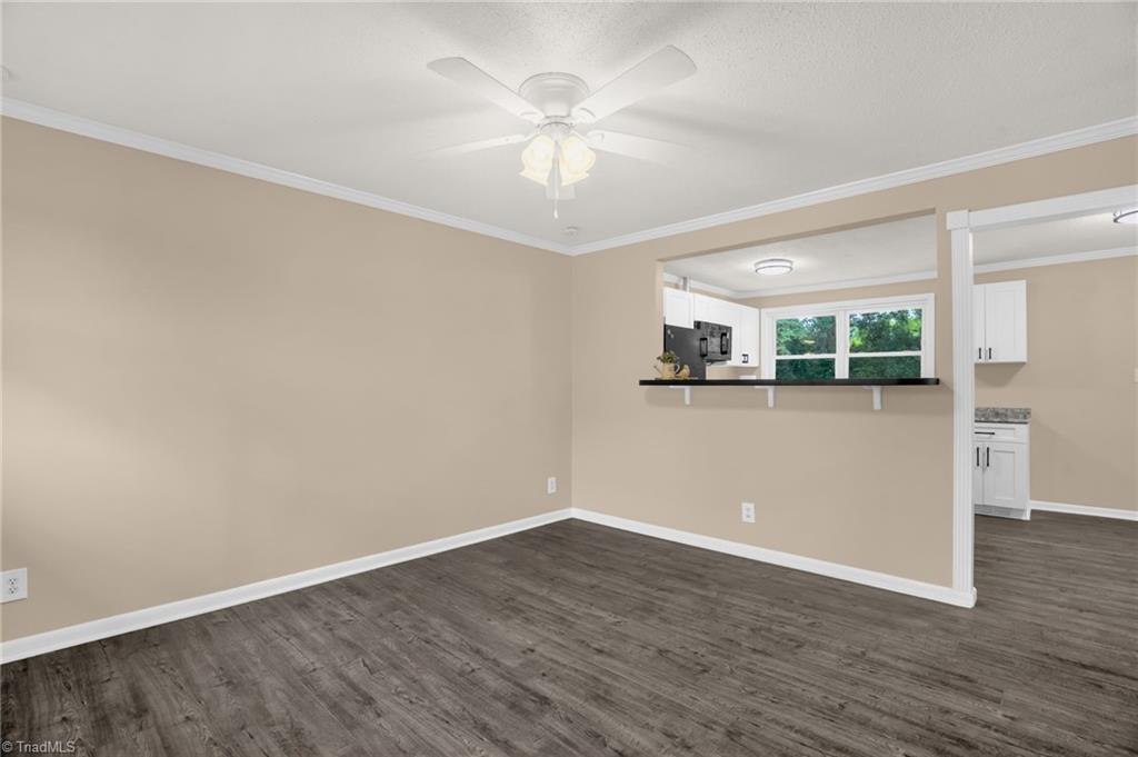 3803 Halifax Road Greensboro, NC 27407 - Photo 4 of 23 living room as you walk in