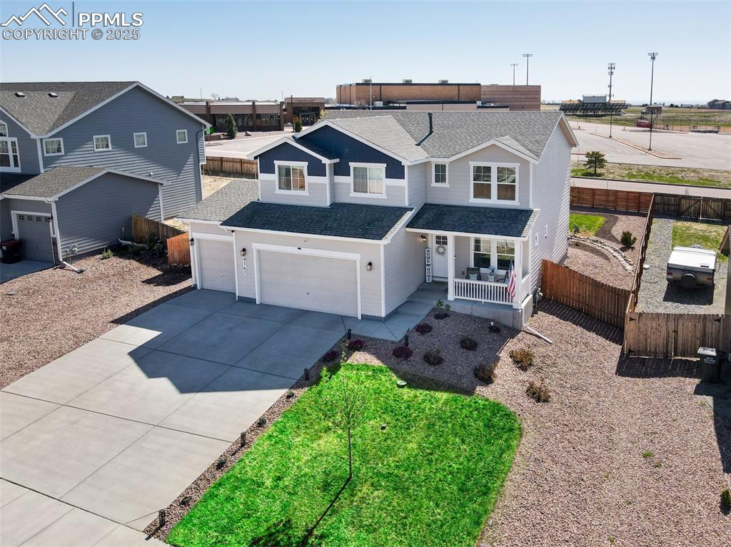 Undisclosed Address Peyton, CO 80831 - Photo 1 of 50 a front view of a house with garden