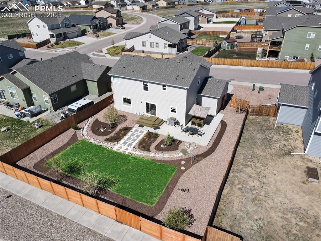 Undisclosed Address Peyton, CO 80831 - Photo 2 of 50 an aerial view of a house with garden
