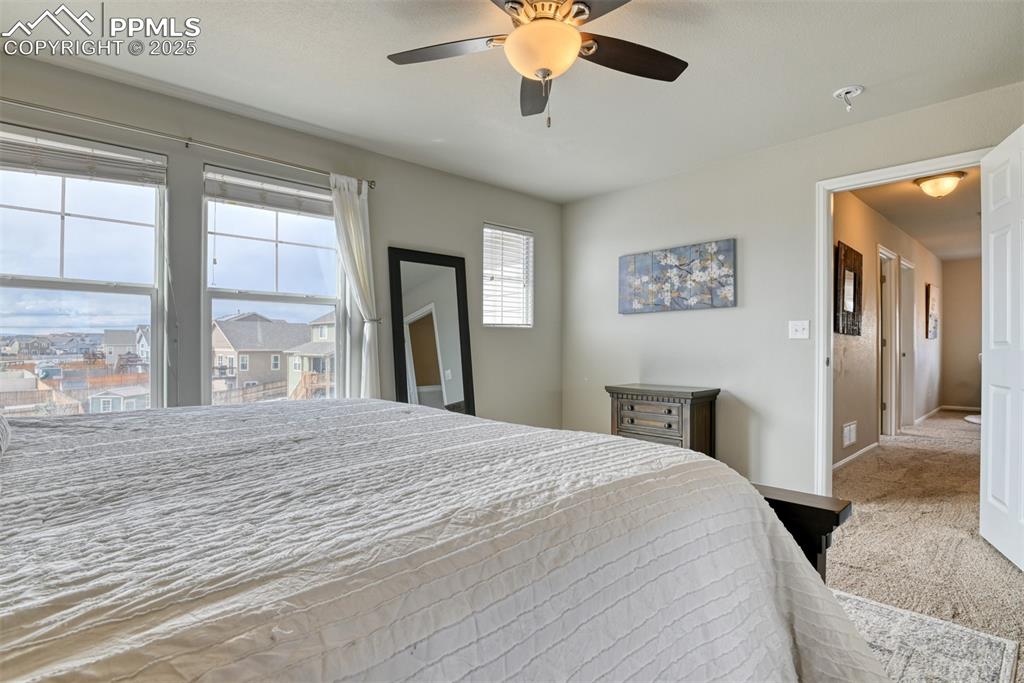 Undisclosed Address Peyton, CO 80831 - Photo 24 of 50 a bedroom with a bed and a large window