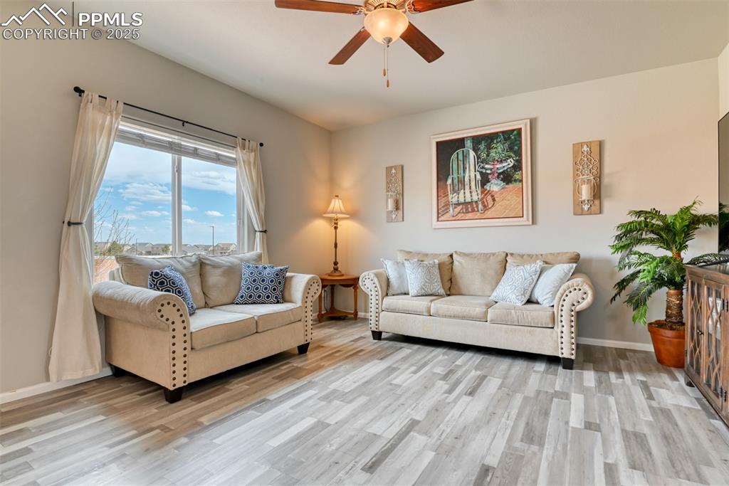Undisclosed Address Peyton, CO 80831 - Photo 3 of 50 a living room with furniture and a large window