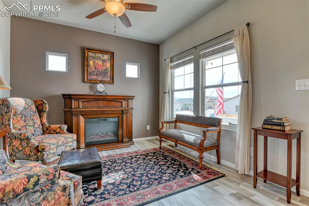 Undisclosed Address Peyton, CO 80831 - Photo 5 of 50 a living room with furniture and a fireplace