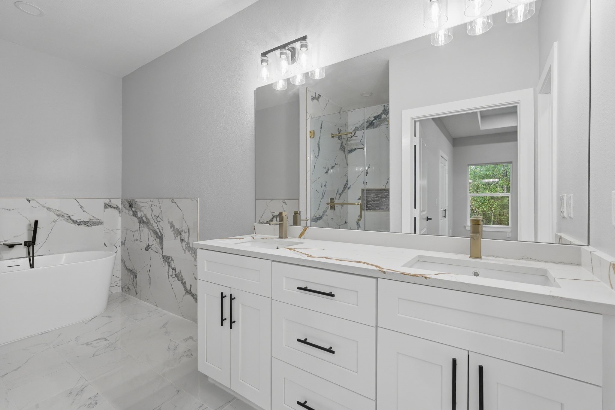 3575 Roy Bean Road Willis, TX 77378 - Photo 22 of 40 a bathroom with a sink and a bathtub