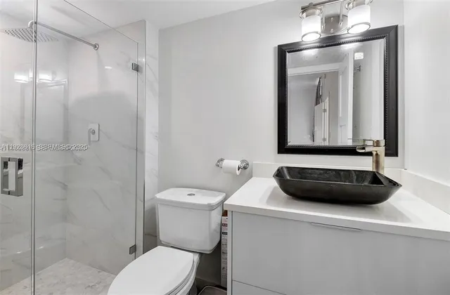 a view of a backyard and swimming pool