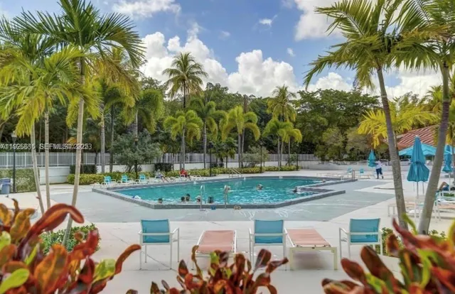 an aerial view of a house with a lake view