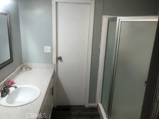 16600 Downey, Unit 115 Paramount, CA 90723 - Photo 8 of 15 a bathroom with a sink and a mirror